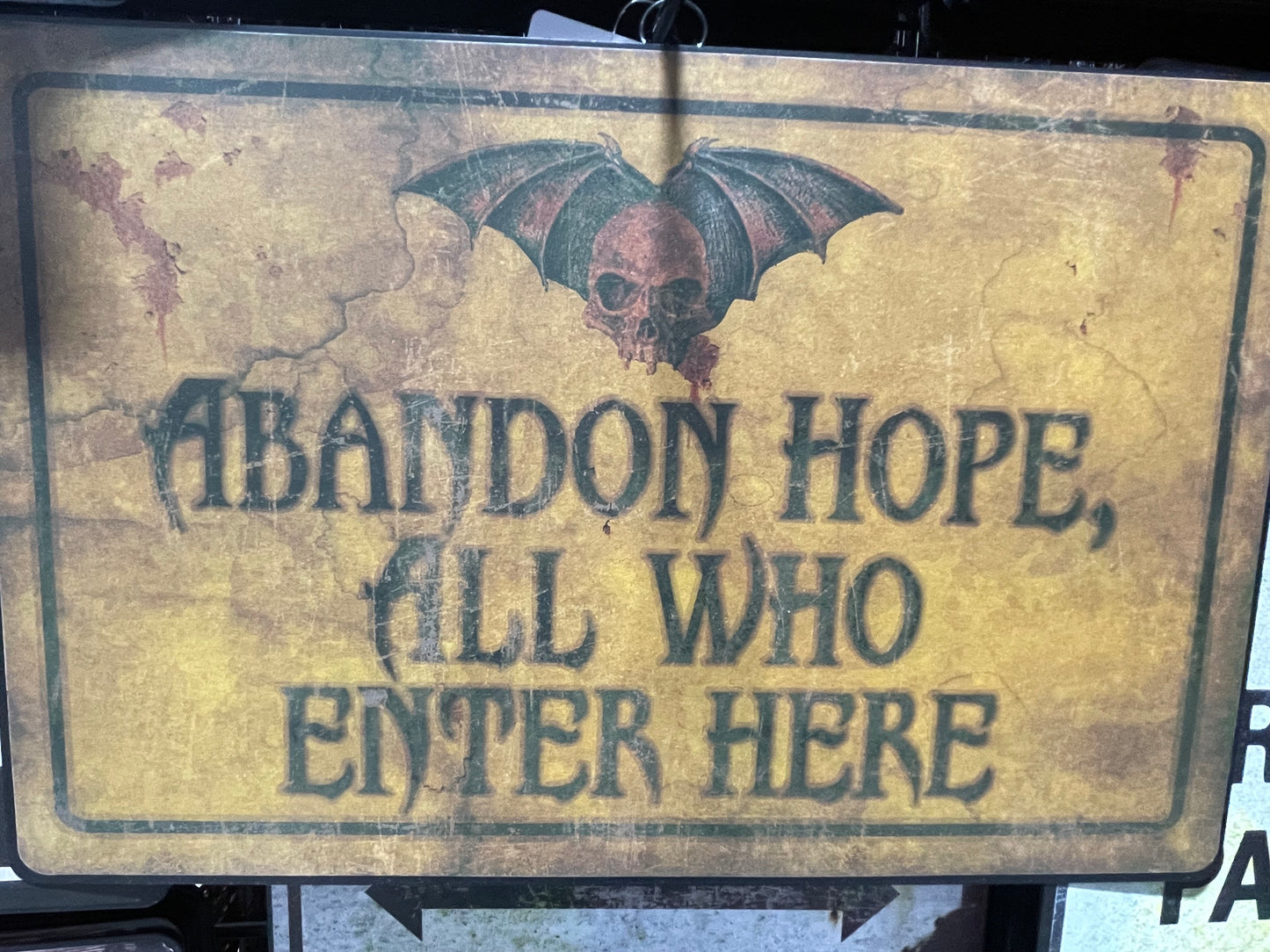ABANDON HOPE, ALL WHO ENTER HERE SIGN